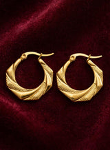 TWISTED GOLD HOOP EARRINGS view 1